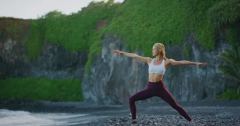 In her beach yoga flow Stock Footage 108176738