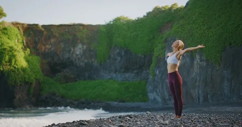 In her beach yoga flow state Stock Footage 108179957