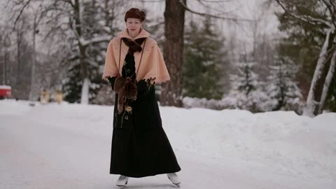 Her every gesture is filled with grace and sophistication, like a page from a Stock Footage 268479769