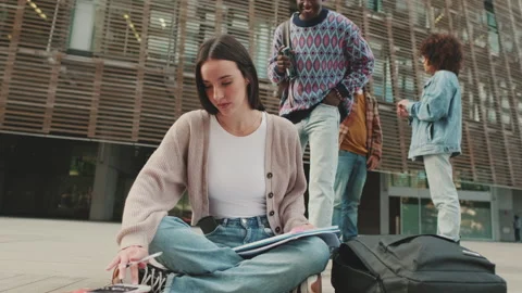 Her friend is interested in her work Stock Footage 227386480