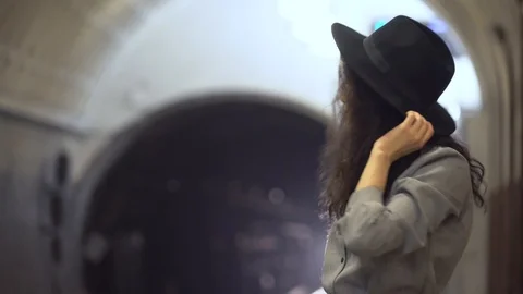 Her hair develops from the wind of a passing train. Stock Footage 114126853