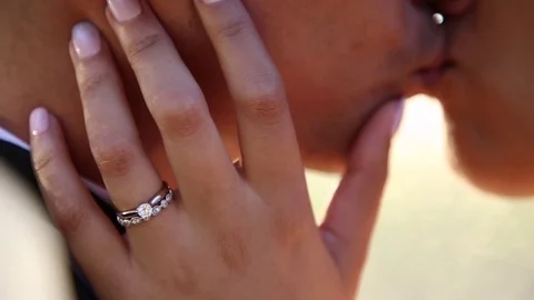 Her Hand On His Cheek While Kissing Stock Footage 115325282