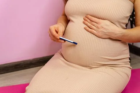 Her peaceful expression, capturing the intimate moment of new beginnings Fotos de archivo