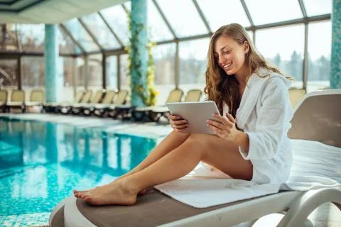 Her poolside entertainment Stock Photos