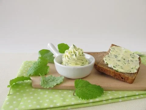 Herb butter and bread Stock Photos