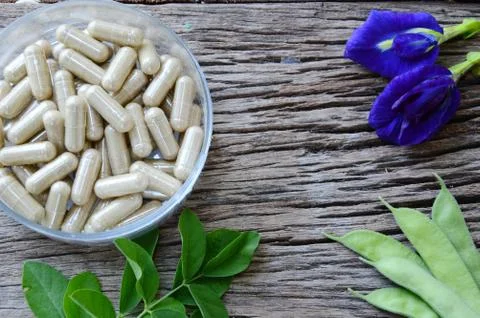 Herb capsule Stock Photos