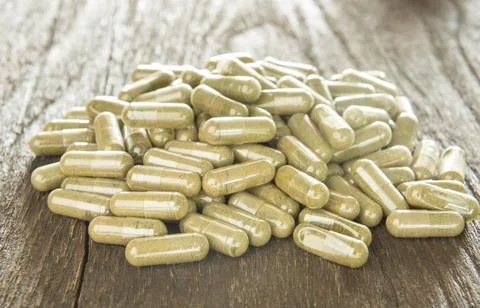 Herb capsule 스톡 사진