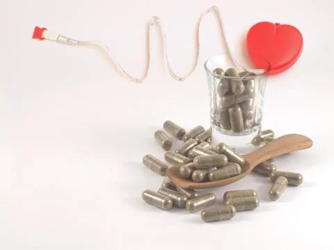 Herb in capsule pill Foto stock