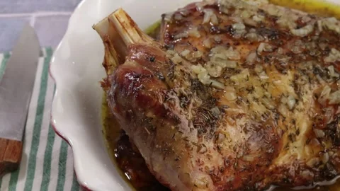 Herb roasted leg of lamb Stock Footage 341243213