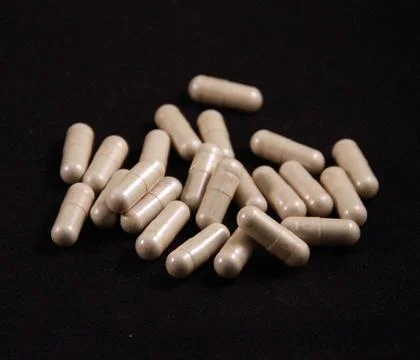 Herbal capsule Stock Photos