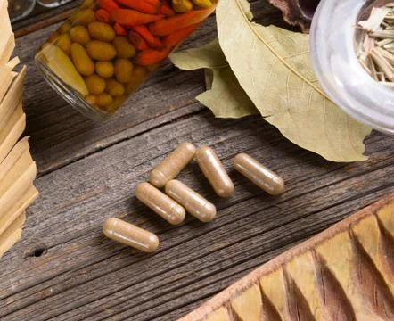 Herbal capsules Stock Photos