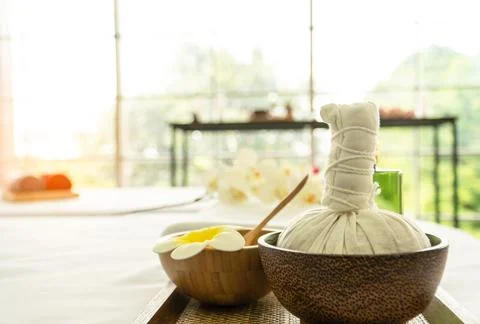 Herbal compress ball with coconut shell spa aroma flowers products skincare. 스톡 사진