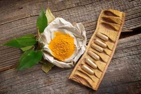 Herbal curcumin capsules Stock Photos