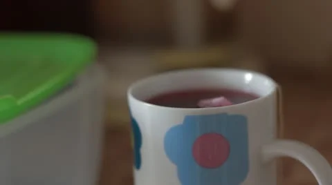 Herbal tea is brewed in a mug Stock Footage 12134289