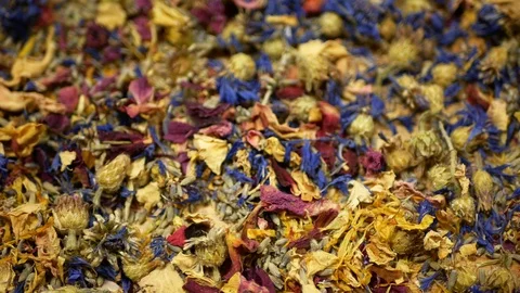 Herbal tea dried blend mixture of rose, cornflower, hibiscus, thyme leaf petals Stock Footage 121727720