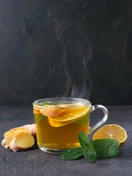 Herbal tea with ginger, mint and lemon Stock Photos