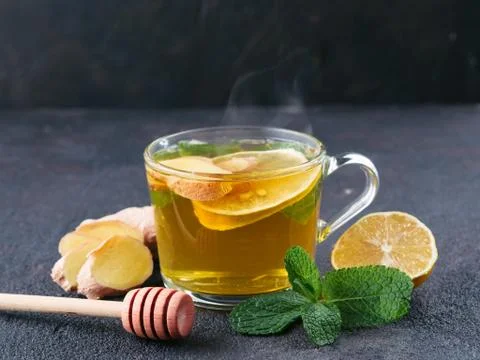 Herbal tea with ginger, mint and lemon Stock Photos
