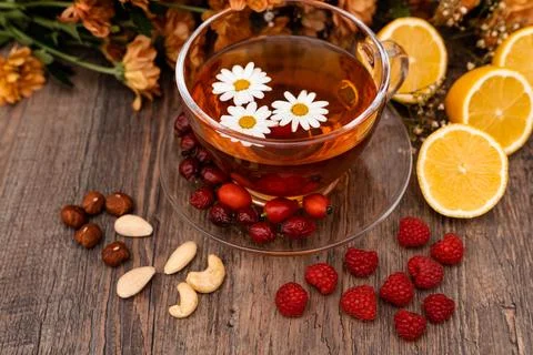 Herbal tea made from rose hips, chamomile and lemons. Fruit tea with vitamins 写真素材