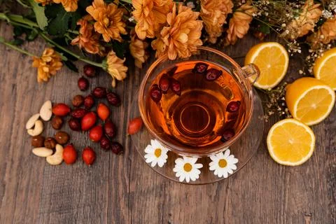 Herbal tea made from rose hips, chamomile and lemons. Fruit tea with vitamins Stock Photos