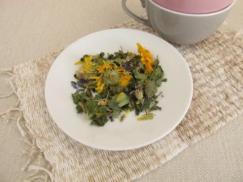 Herbal tea mix and empty cups Stock Photos