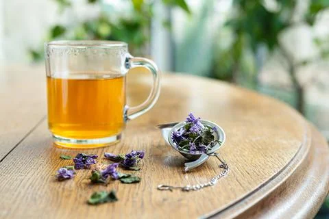 Herbal tea on an old table Stock Photos