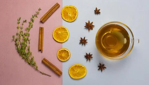 Herbal tea on pascal color background rose and blue - thymian cinnamon lemon Stock Photos