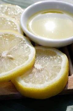 Herbal tea with sliced lemons Stock Photos