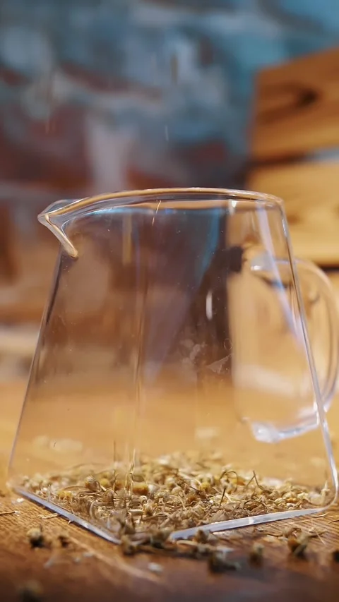 Herbal tea. tea drink. chamomile tea. brewing herbal tea. close-up. dry Stock Footage 323437011