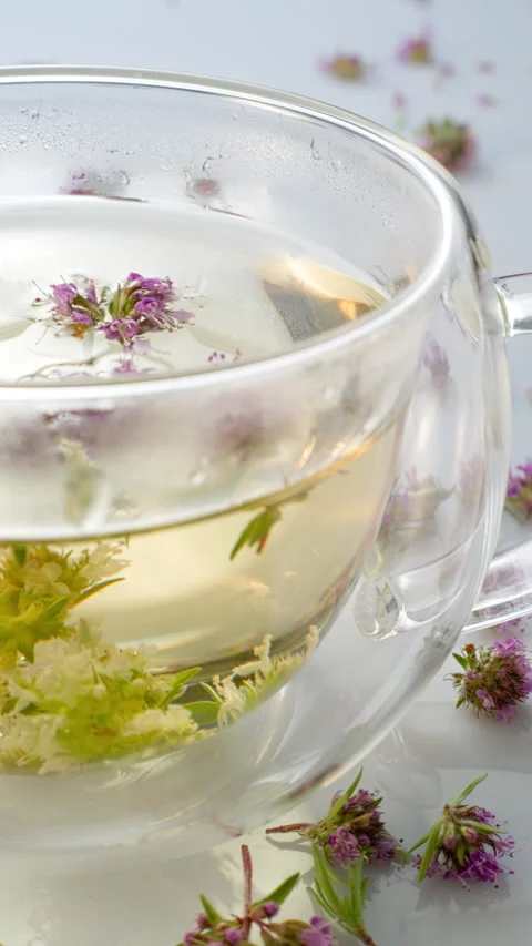 Herbal tea with thyme. close-up. Stock Footage 309893081