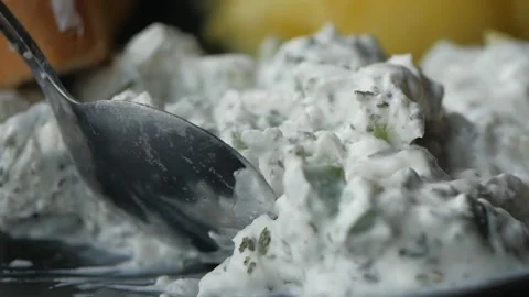 Herbed Cream Cheese Dip With Lemon and Bread Close-Up, Fresh Savory Appetizer Video stock 338042187