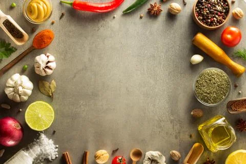 Herbs and spices at table Stock Photos