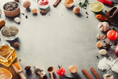 Herbs and spices at table Stock Photos
