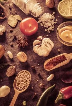 Herbs and spices at table Stock Photos