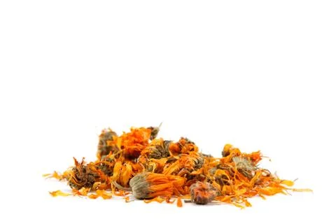 Herbs. dried calendula or pot marigold flowers isolated on white background. Stock Photos