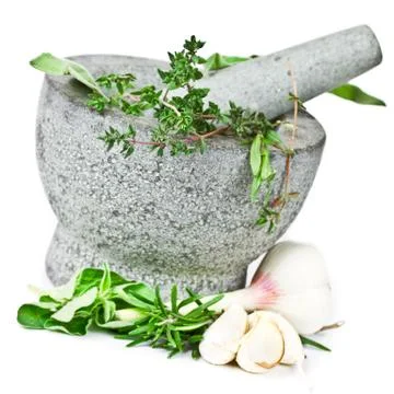 Herbs in mortar Stock Photos