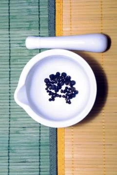 Herbs in mortar Stock Photos