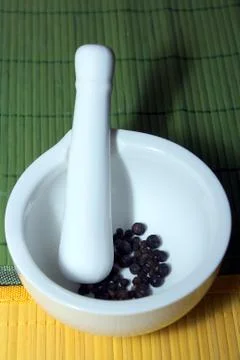 Herbs in mortar Stock Photos