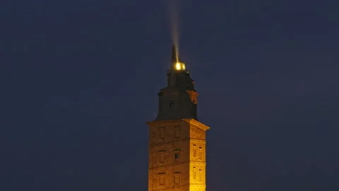Hercules Tower Beacon Shining in Twilight Stock Footage 275839076