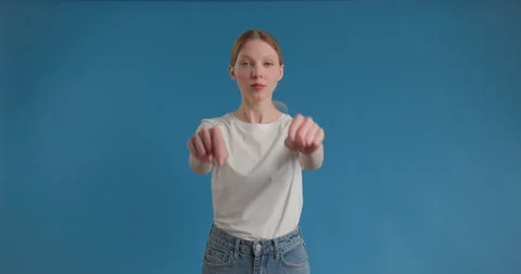 Here and now. Self confident bossy woman pointing fingers seriously looking at Video stock 150401739