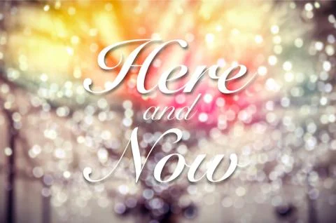 Here Now typography on bokeh background Stock Photos