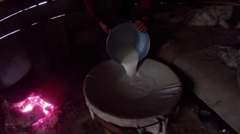 Here so that the filter only milking sheep milk in the mountains Stock Footage 43224342