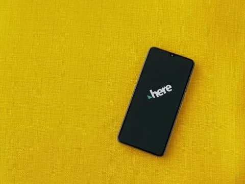 HERE WeGo app launch screen with logo on the display of a black mobile smartp Stock Photos