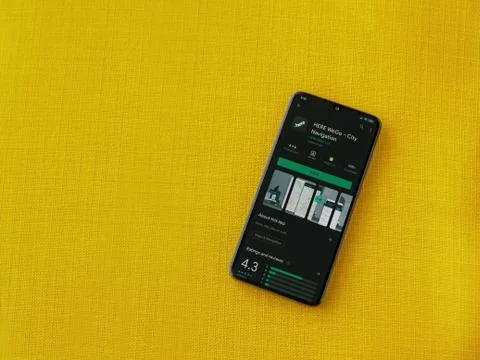 HERE WeGo app play store page on the display of a black mobile smartphone on  Stock Photos