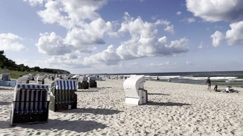 Heringsdorf: Clouds over the imperial beach with beach chairs, 4K Stock Footage 280681736