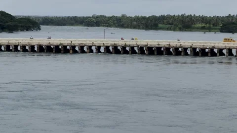 Heritage stone bridge with overflowing river water in India. Stock Footage 247093404