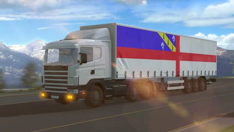 Herm flag shown on the side of a large truck Stock Footage 122100082