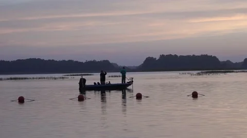 Hernando, Florida - July 25, 2020 Fishing at daybreak in a Florida lake. 4K Stock Footage 136055072