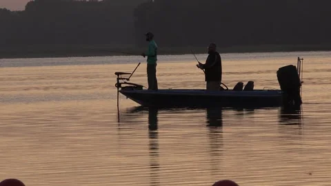 Hernando, Florida - July 25, 2020 Fishing at daybreak in a Florida lake. 4K Vídeo Stock 136055815