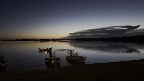 Hernando, Florida - July 25, 2020 Fishing at daybreak in a Florida lake. 4K Stock Footage 316548379