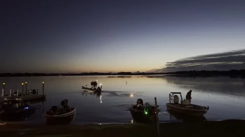 Hernando, Florida - July 25, 2025 Fishing at daybreak in a Florida lake. 4K Stock Footage 316548351